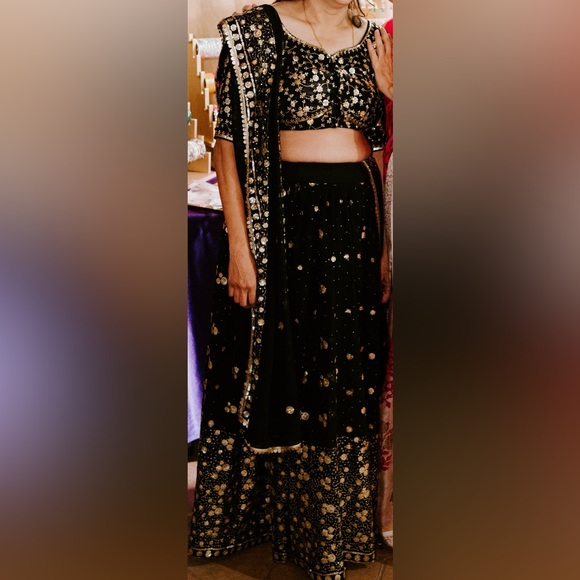 Elegant Black and Gold Embellished Lehenga - Picture 2 of 9